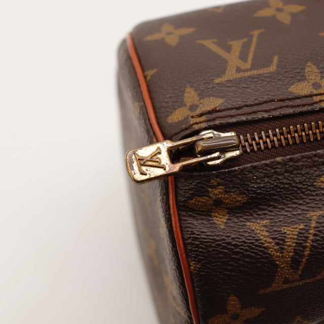 Détail de l'argenterie dorée Louis Vuitton Papillon 30 Toile Monogramme occasion authentique — AMANA Vintage