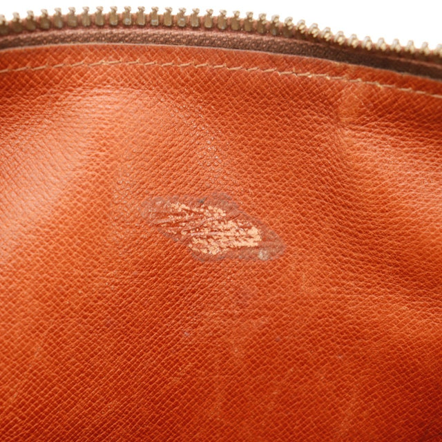 Détail des fonds circulaires Louis Vuitton Papillon 30 Toile Monogramme occasion authentique — AMANA Vintage