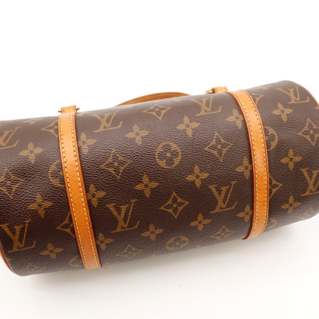 Détail des attaches Louis Vuitton Papillon 26 cuir vachette occasion authentique — AMANA Vintage