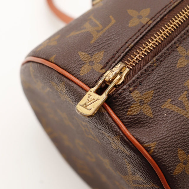 Détail de la fermeture Louis Vuitton Papillon 30 Toile Monogramme occasion authentique — AMANA Vintage