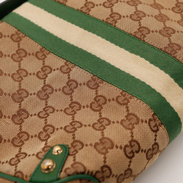 dettaglio tela monogrammata e nastro Web Gucci Hobo Horsebit autentico di seconda mano — AMANA Vintage