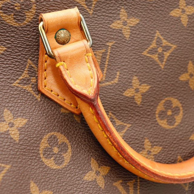 Détail du cadenas Louis Vuitton Speedy 35 Toile Monogramme occasion authentique — AMANA Vintage