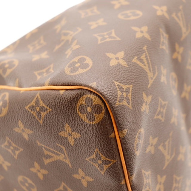 Détail du date code Louis Vuitton Speedy 35 Toile Monogramme occasion authentique — AMANA Vintage