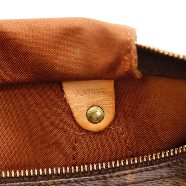 Détail de la fermeture Louis Vuitton Speedy 30 Toile Monogramme occasion authentique — AMANA Vintage