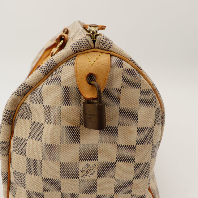 Amana-vintage-betaalbare-luxetassen-tas-details-pre-owned-speedy-dior-pre-owned-exclusieve-authentieke-vuitton-tas-noé-papillon