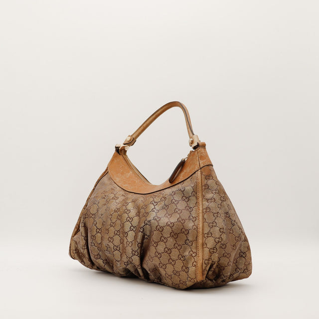 Sac Gucci Hobo vue latérale silhouette souple occasion authentique — AMANA Vintage