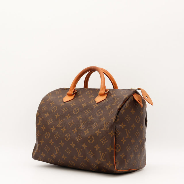 Vue de trois-quarts Louis Vuitton Speedy 30 Toile Monogramme occasion authentique — AMANA Vintage
