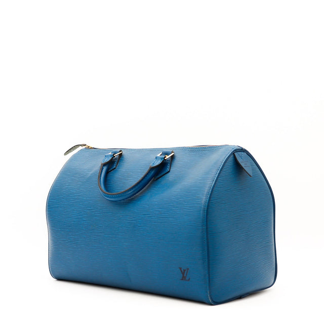 Détail des anses Louis Vuitton Speedy 35 cuir Épi bleu occasion authentique — AMANA Vintage