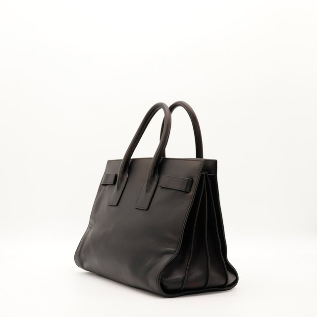 Vue de profil Sac de Jour Small Saint Laurent cuir noir occasion authentique — AMANA Vintage