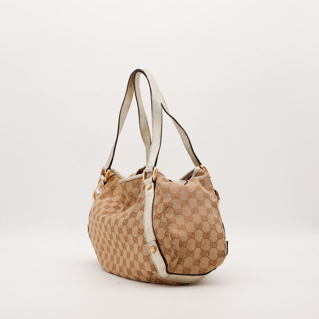 Détail anses cuir argenté sac Gucci Hobo toile monogrammée — AMANA Vintage