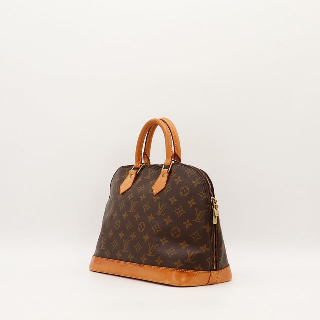 Sac Louis Vuitton Alma PM vue trois quarts cuir vachette patiné — AMANA Vintage