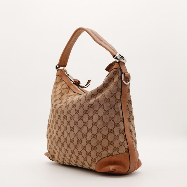 Sac Gucci Hobo Miss vue de trois quarts cuir marron occasion authentique — AMANA Vintage