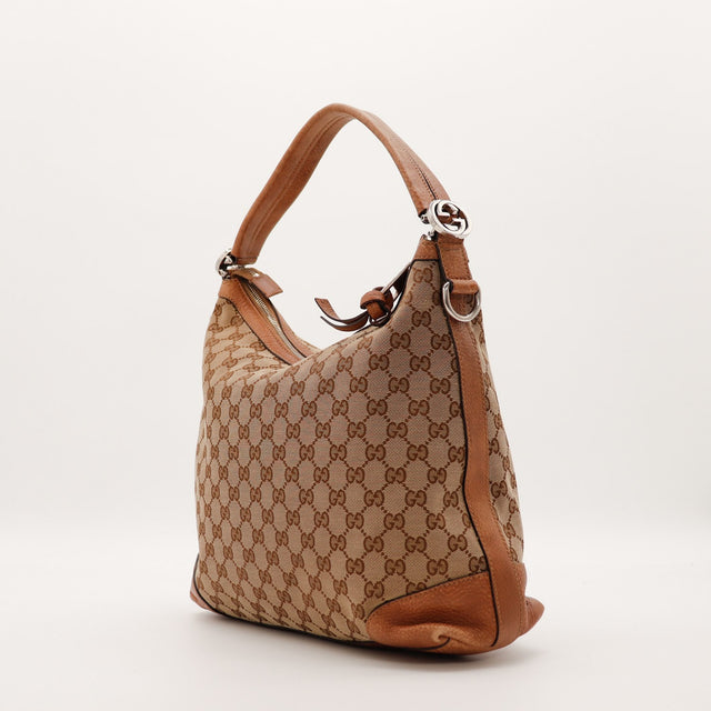 Détail charm GG argenté anse cuir Gucci Hobo Miss occasion authentique — AMANA Vintage