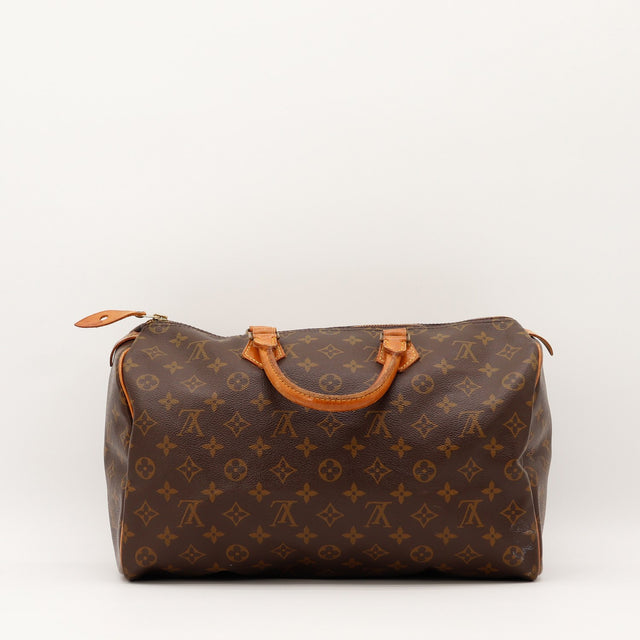 Détail de la fermeture Louis Vuitton Speedy 35 Toile Monogramme occasion authentique — AMANA Vintage