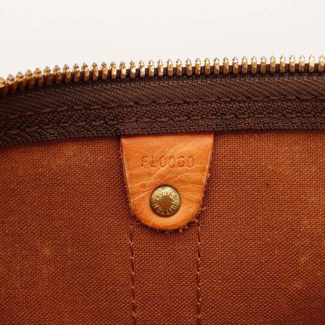 Date code FL0060 intérieur Louis Vuitton Keepall 55 doublure marron — AMANA Vintage