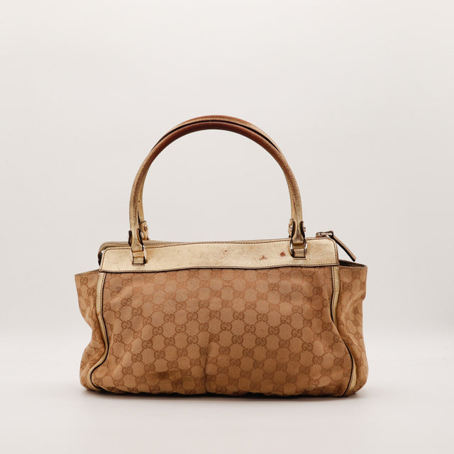 Face arrière Tote Gucci toile monogrammée taches cuir doré — AMANA Vintage