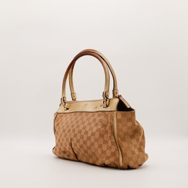 Vue de trois quarts arrière Tote Gucci cuir doré usé — AMANA Vintage