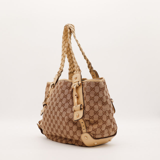 Détail garnitures cuir beige et finitions cloutées Gucci Pelham occasion authentique — AMANA Vintage