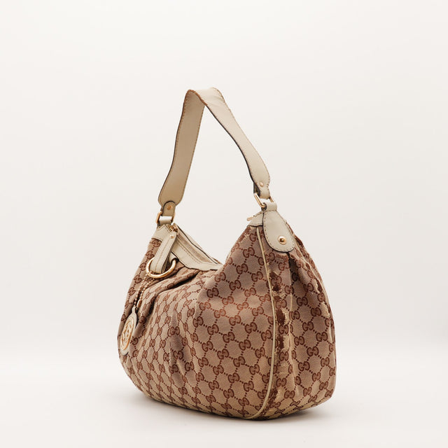 Sac Gucci Sukey vue de trois quarts cuir ivoire occasion authentique — AMANA Vintage