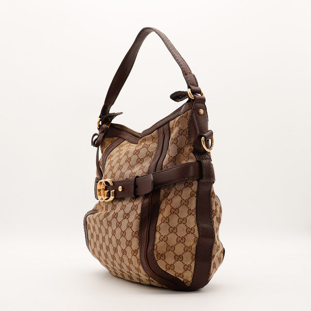 Sac Gucci Hobo toile monogrammée vue de trois quarts occasion authentique — AMANA Vintage
