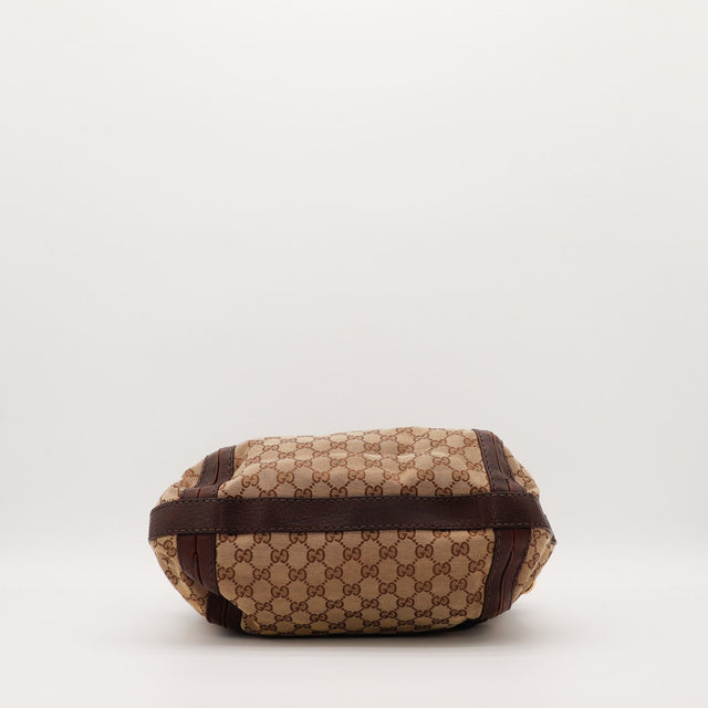 Dessous du sac Gucci Hobo toile monogrammée occasion authentique — AMANA Vintage