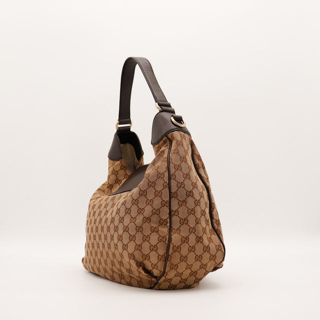 Profil du sac Gucci Hobo Horsebit cuir marron et toile monogrammée occasion authentique — AMANA Vintage