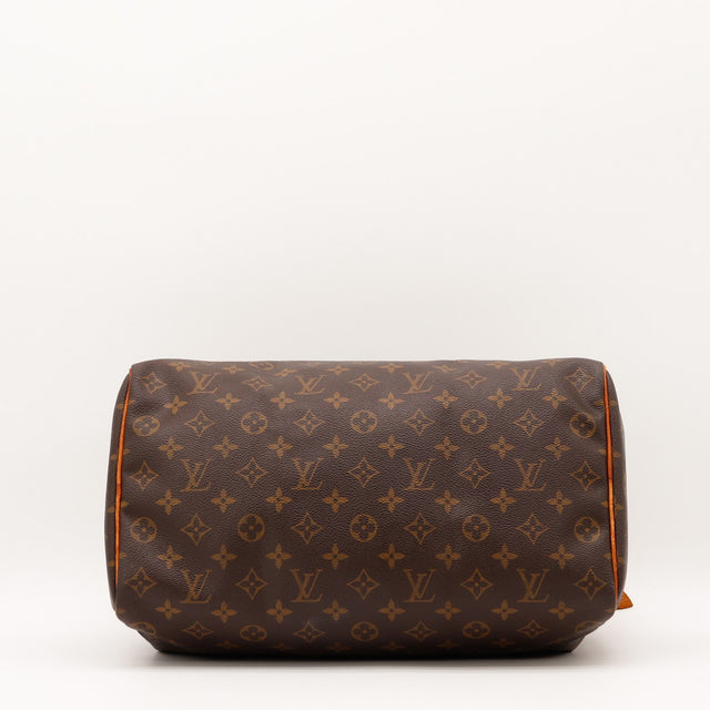 Détail fermeture éclair et tirette Louis Vuitton Speedy 35 occasion authentique — AMANA Vintage