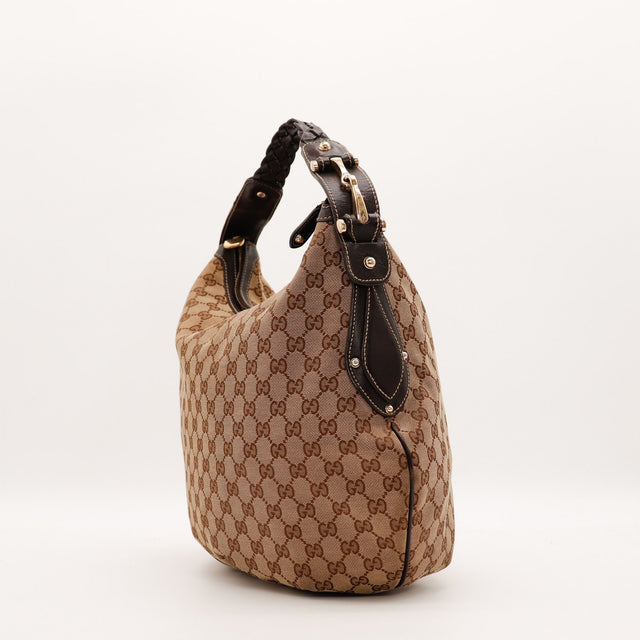 Détail anse tressée et boucle dorée Gucci Hobo occasion authentique — AMANA Vintage