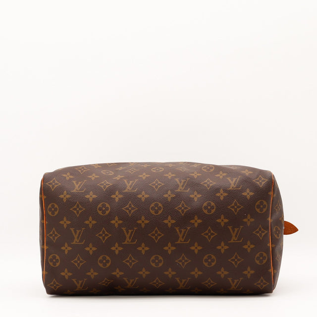 Détail du cuir vachette patiné Louis Vuitton Speedy 35 occasion authentique — AMANA Vintage