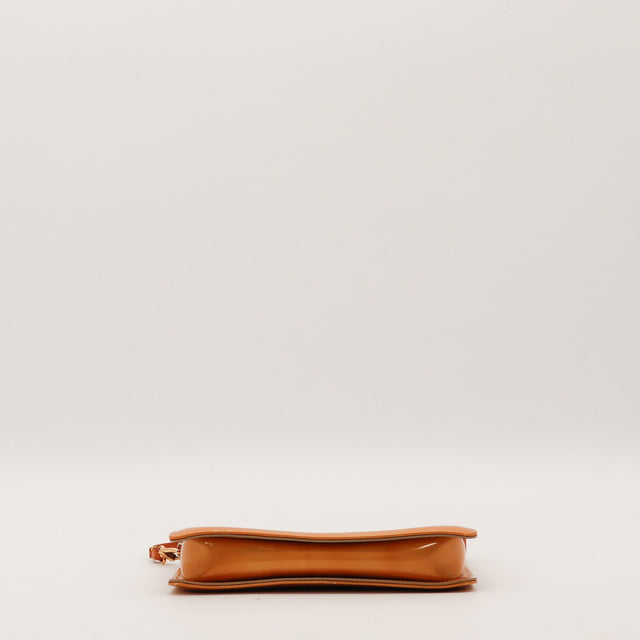 Base de la pochette Louis Vuitton Vernis bronze occasion authentique — AMANA Vintage