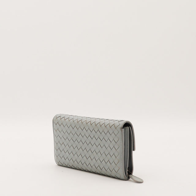 Portefeuille Bottega Veneta Intrecciato gris vue de profil occasion authentique — AMANA Vintage