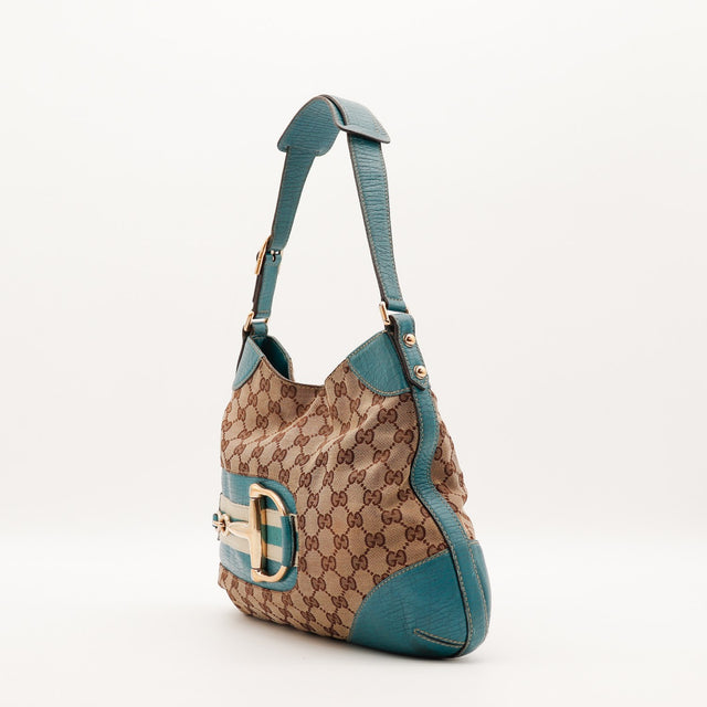 Sac Gucci Jackie Horsebit vue de trois quarts cuir turquoise occasion authentique — AMANA Vintage
