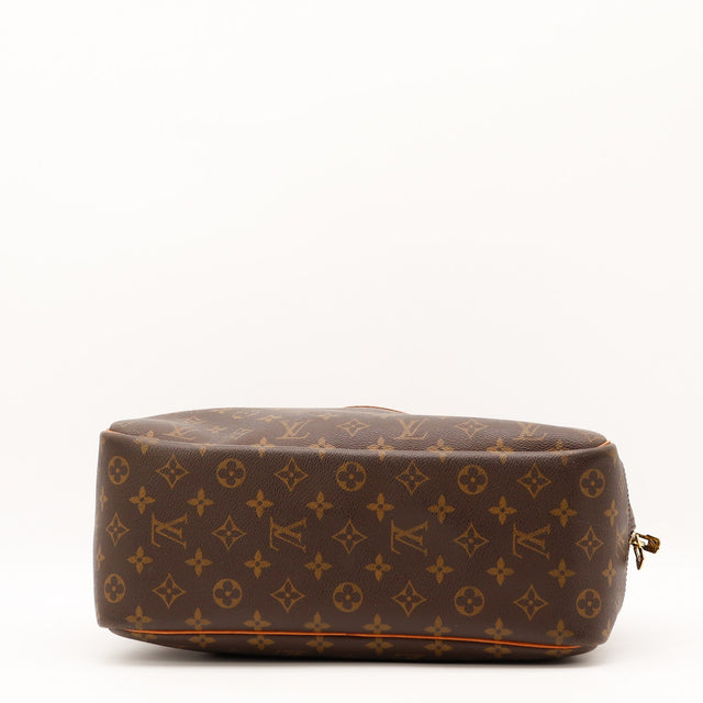Détail de la fermeture zippée Louis Vuitton Deauville Toile Monogramme occasion authentique — AMANA Vintage