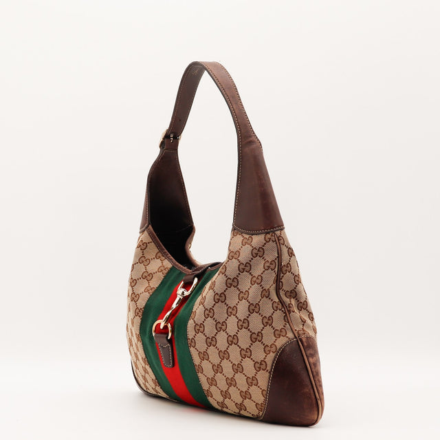 Vue de dos Gucci New Jackie toile monogrammée beige occasion authentique — AMANA Vintage