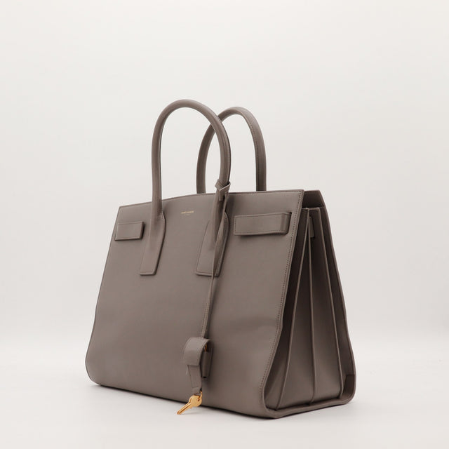 Sac de Jour Grand Saint Laurent taupe vue de trois quarts côté droit occasion — AMANA Vintage