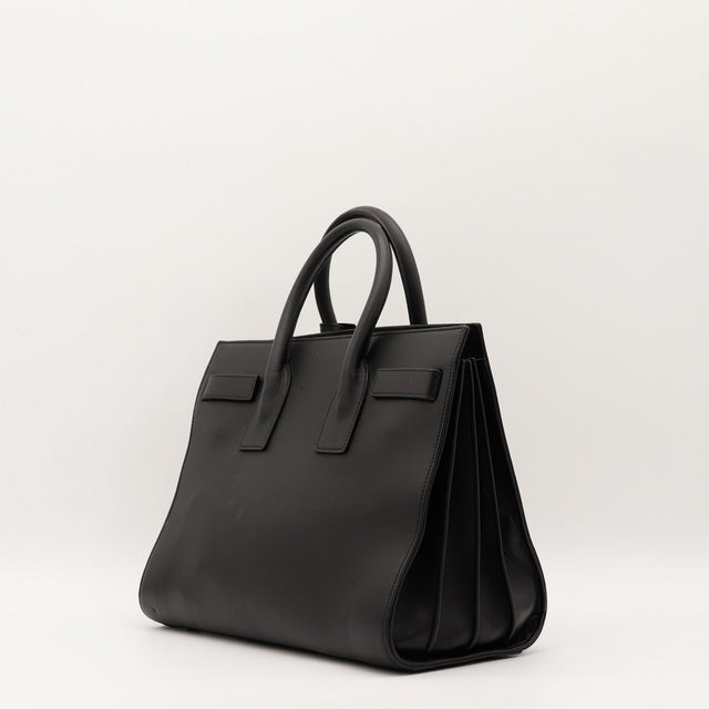Sac de Jour Small Saint Laurent soufflets latéraux cuir noir occasion authentique — AMANA Vintage