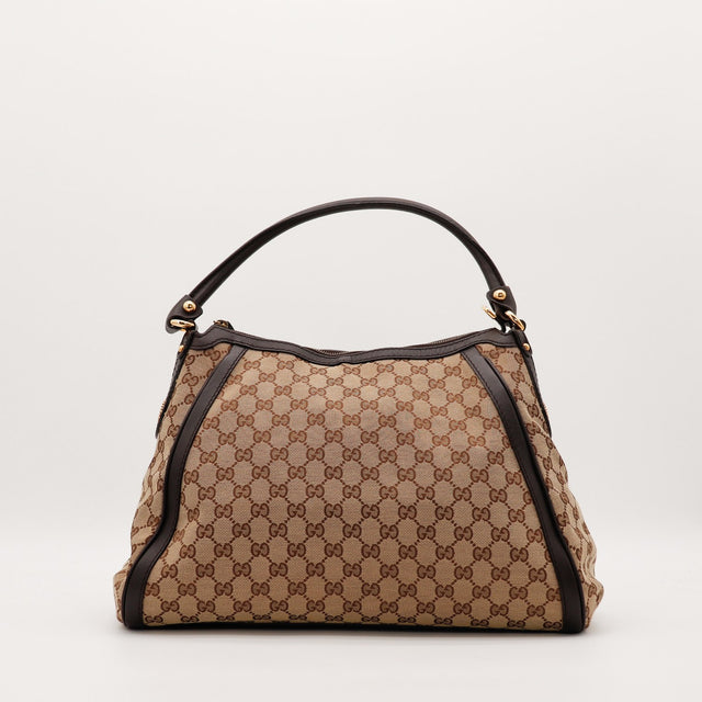Hobo Gucci toile monogrammée beige et cuir marron foncé vue de face occasion authentique — AMANA Vintage