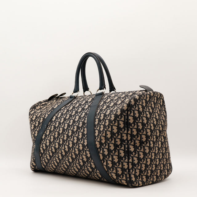 Sac Dior Boston Trotter vue latérale cuir bleu marine occasion authentique — AMANA Vintage