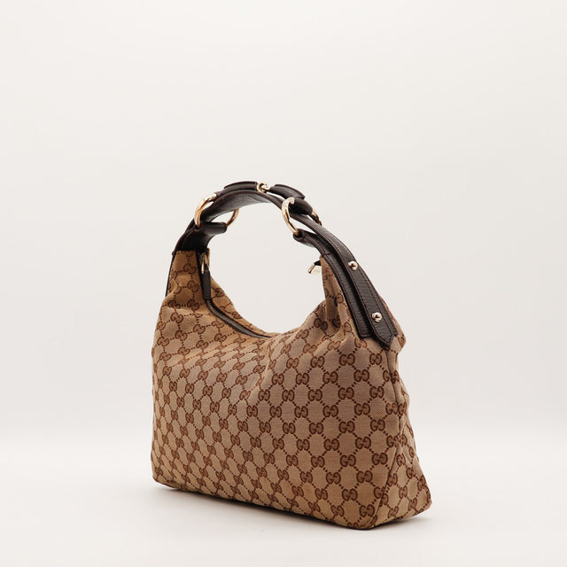 Sac Gucci Hobo vue de trois quarts anse cuir marron occasion authentique — AMANA Vintage