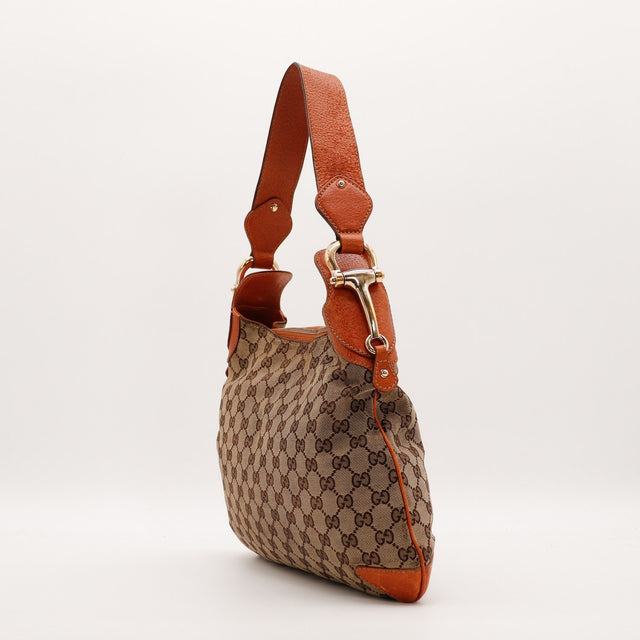 Vue latérale Hobo Horsebit Gucci fermoir mors de cheval doré — AMANA Vintage