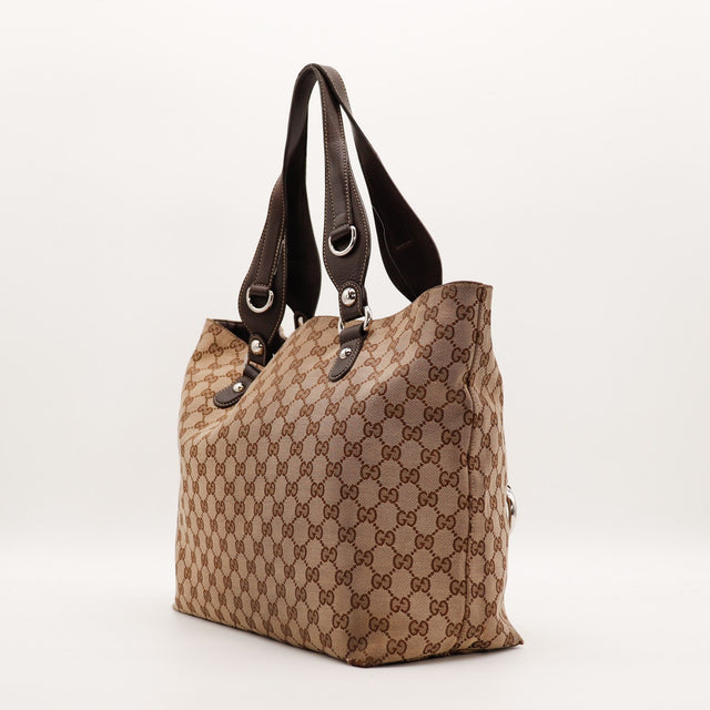 Vue de trois quarts dos Tote Horsebit Gucci cuir marron anses — AMANA Vintage