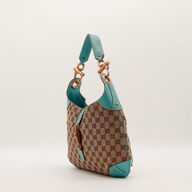 Sac Gucci New Jackie vue de trois quarts cuir turquoise occasion authentique — AMANA Vintage