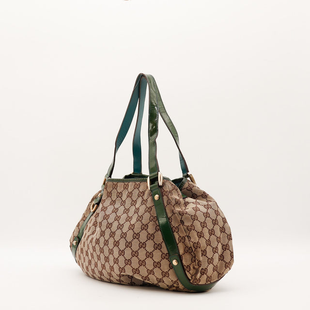 Sac Gucci Hobo vue trois quarts toile monogrammée occasion authentique — AMANA Vintage
