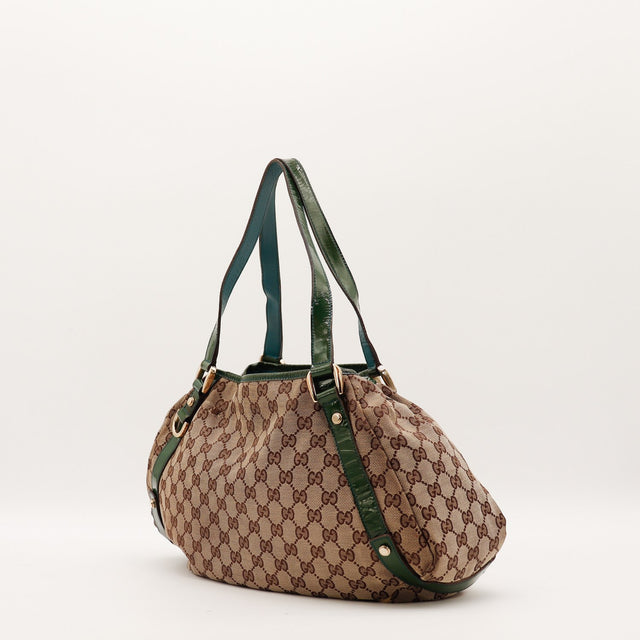 Sac Gucci Hobo vue de côté cuir verni vert — AMANA Vintage