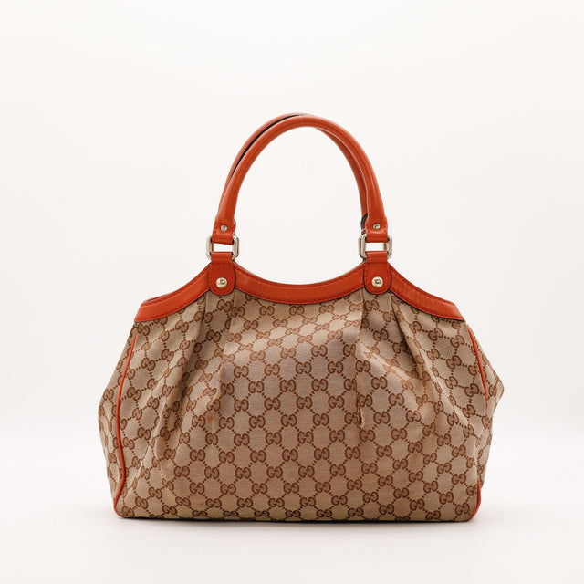 Sac Gucci Sukey vue de dos toile monogrammée cuir rouge — AMANA Vintage