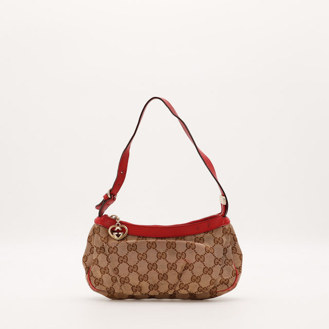 Pochette Gucci toile monogrammée cuir rouge vue de face occasion authentique — AMANA Vintage