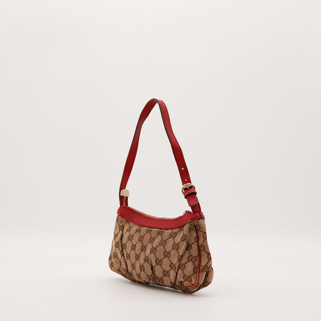 Pochette Gucci monogramme rouge vue de dos — AMANA Vintage