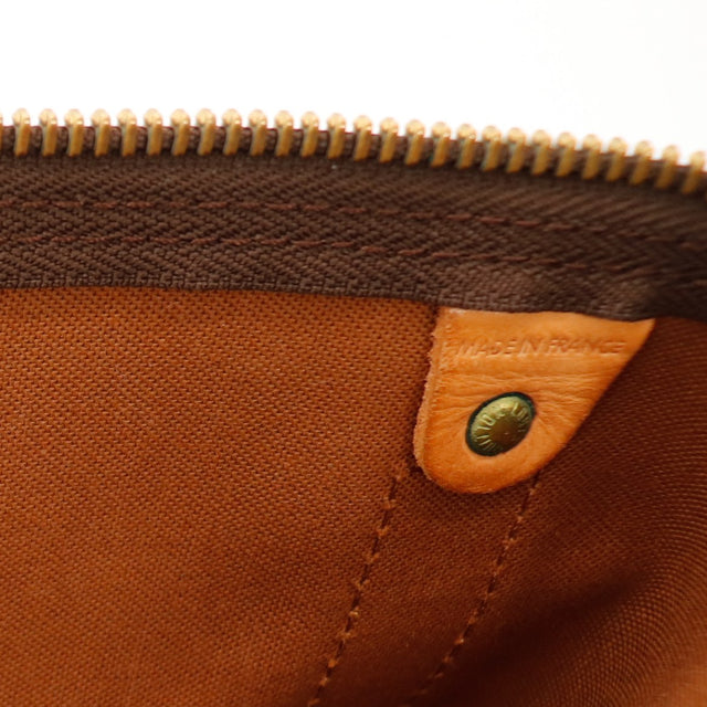 Vue generale Louis Vuitton Keepall 50 Bandouliere toile Monogram patine caramel — AMANA Vintage