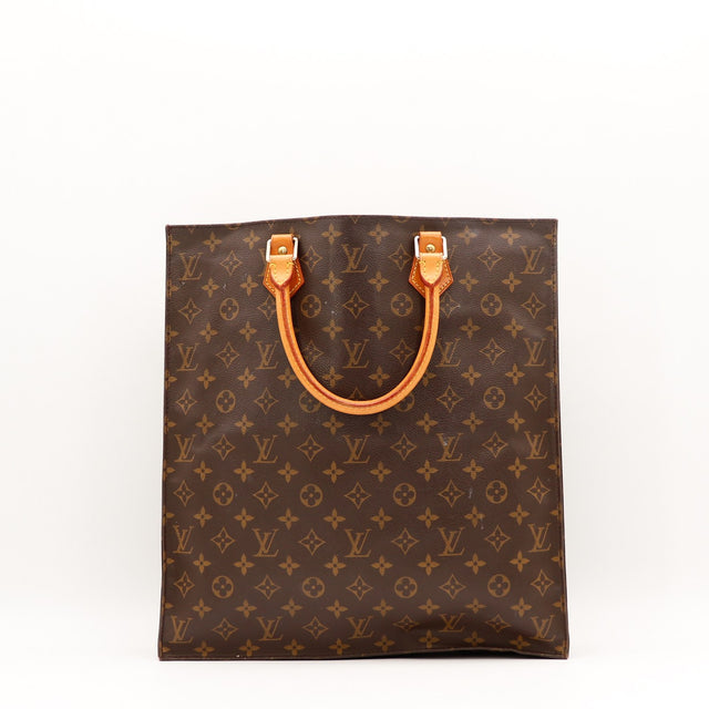 Détail des anses en cuir vachette Louis Vuitton Sac Plat patine caramel occasion authentique — AMANA Vintage