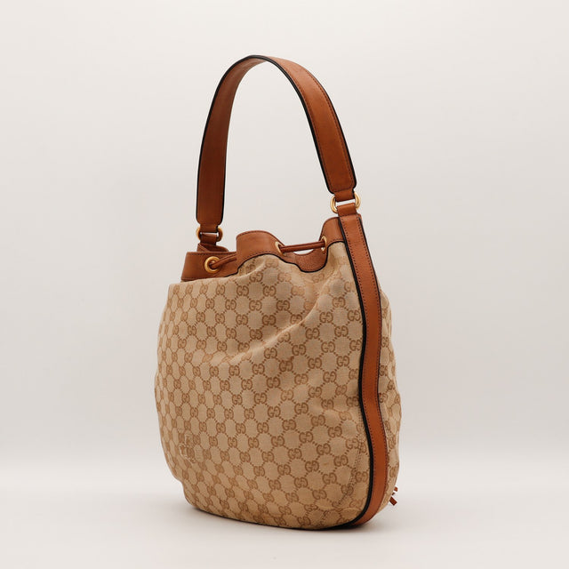 Sac seau Gucci Web vue de côté anse cuir cognac — AMANA Vintage